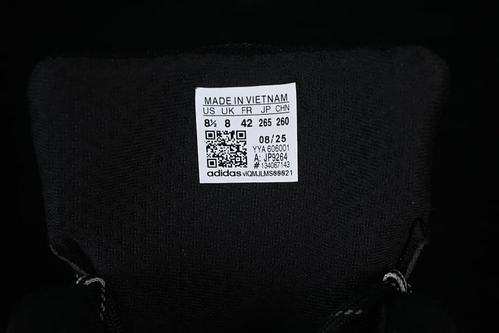 Inside shoe label showing size information and style code JP9264.