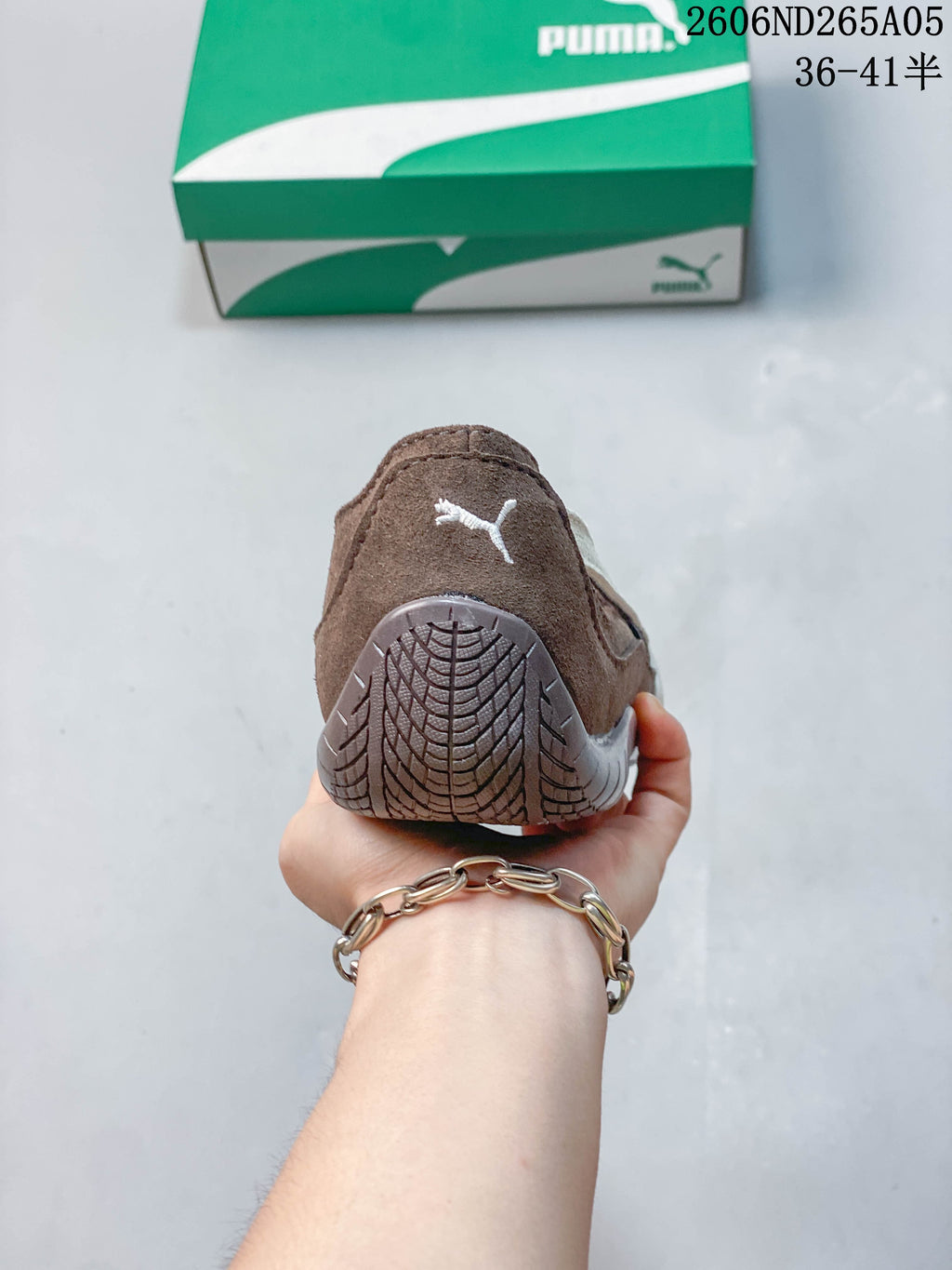 Heel view of a brown PUMA Speedcat Ballet shoe
