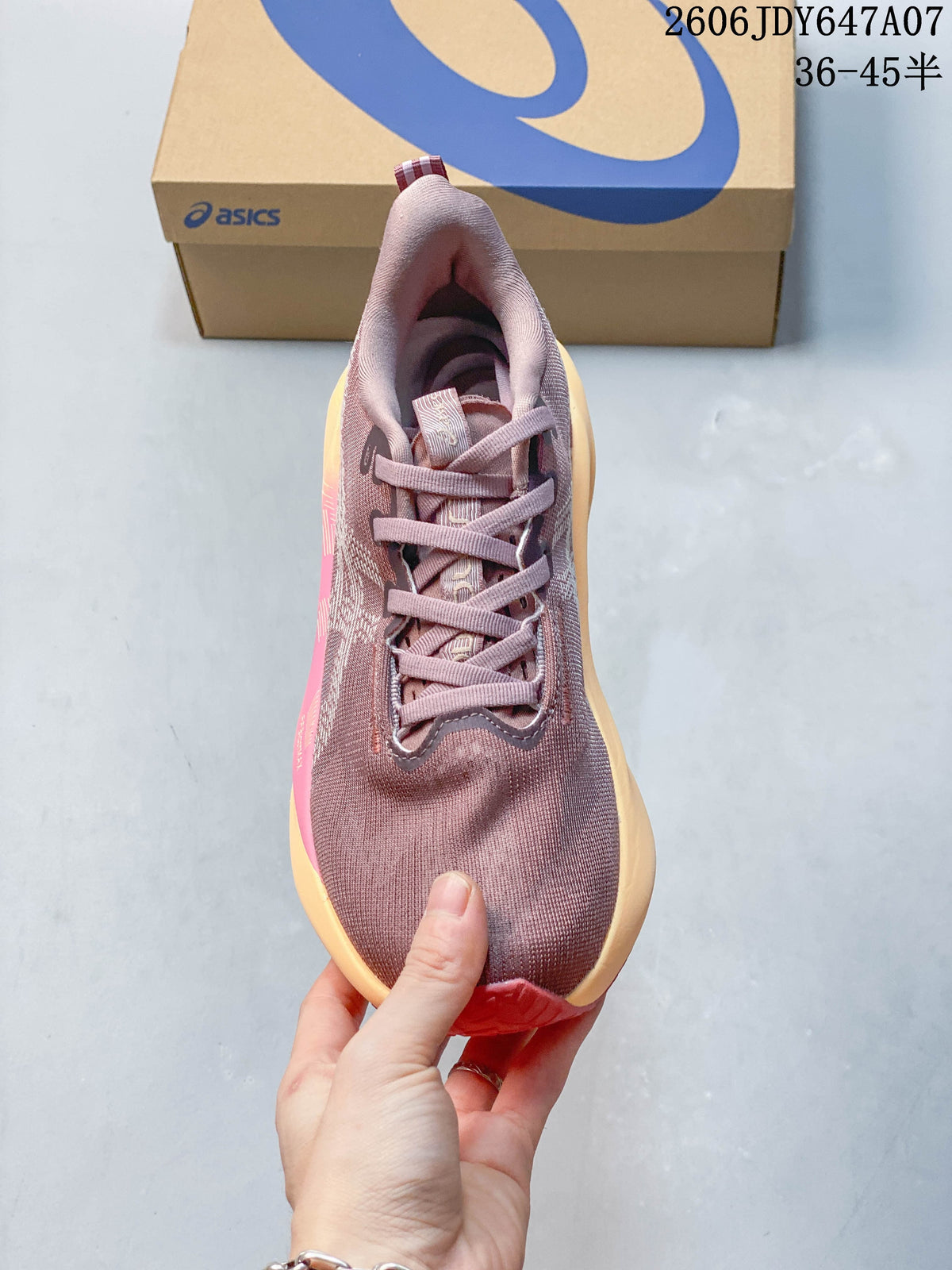 Top view of a mauve ASICS Novablast 5 running shoe with laces and a patterned upper
