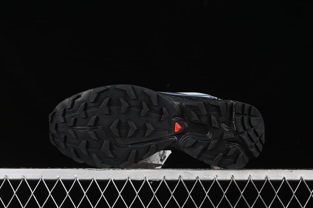 Underside view showing the black lugged outsole.