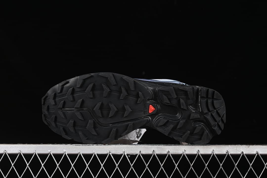 Underside view showing the black lugged outsole.