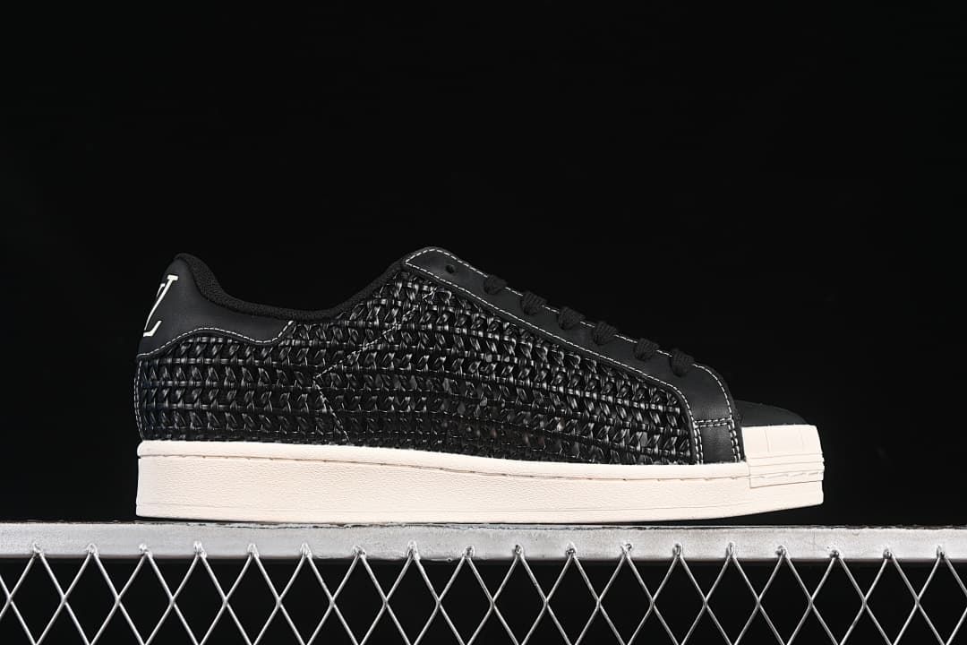 Side profile showing the woven-look upper and off-white sole