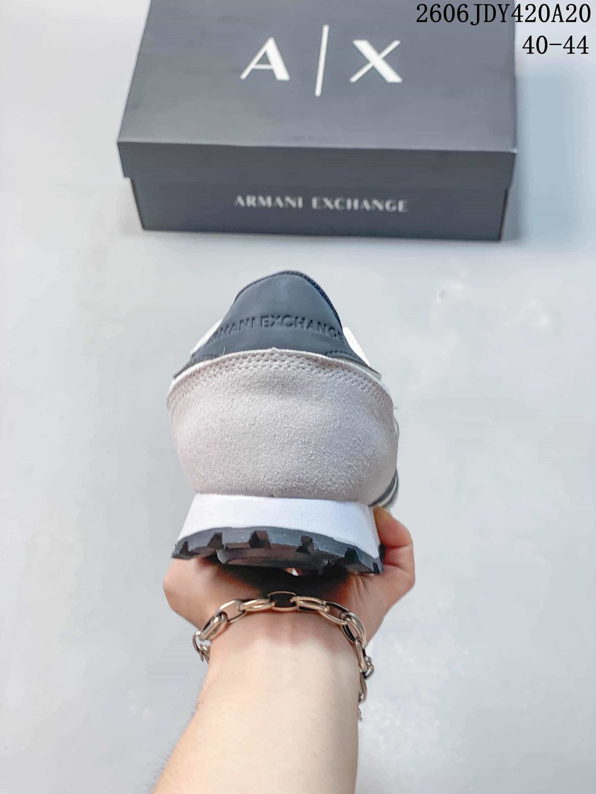 Rear view showing the heel, white midsole, and dark outsole