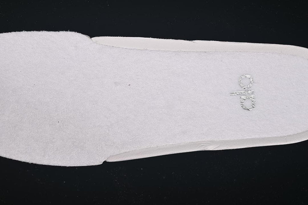 Close-up of the insole with Alo branding