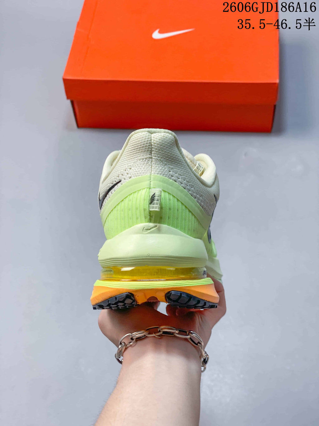 Rear view of the Nike Pegasus Premium sneaker with a translucent green heel detail