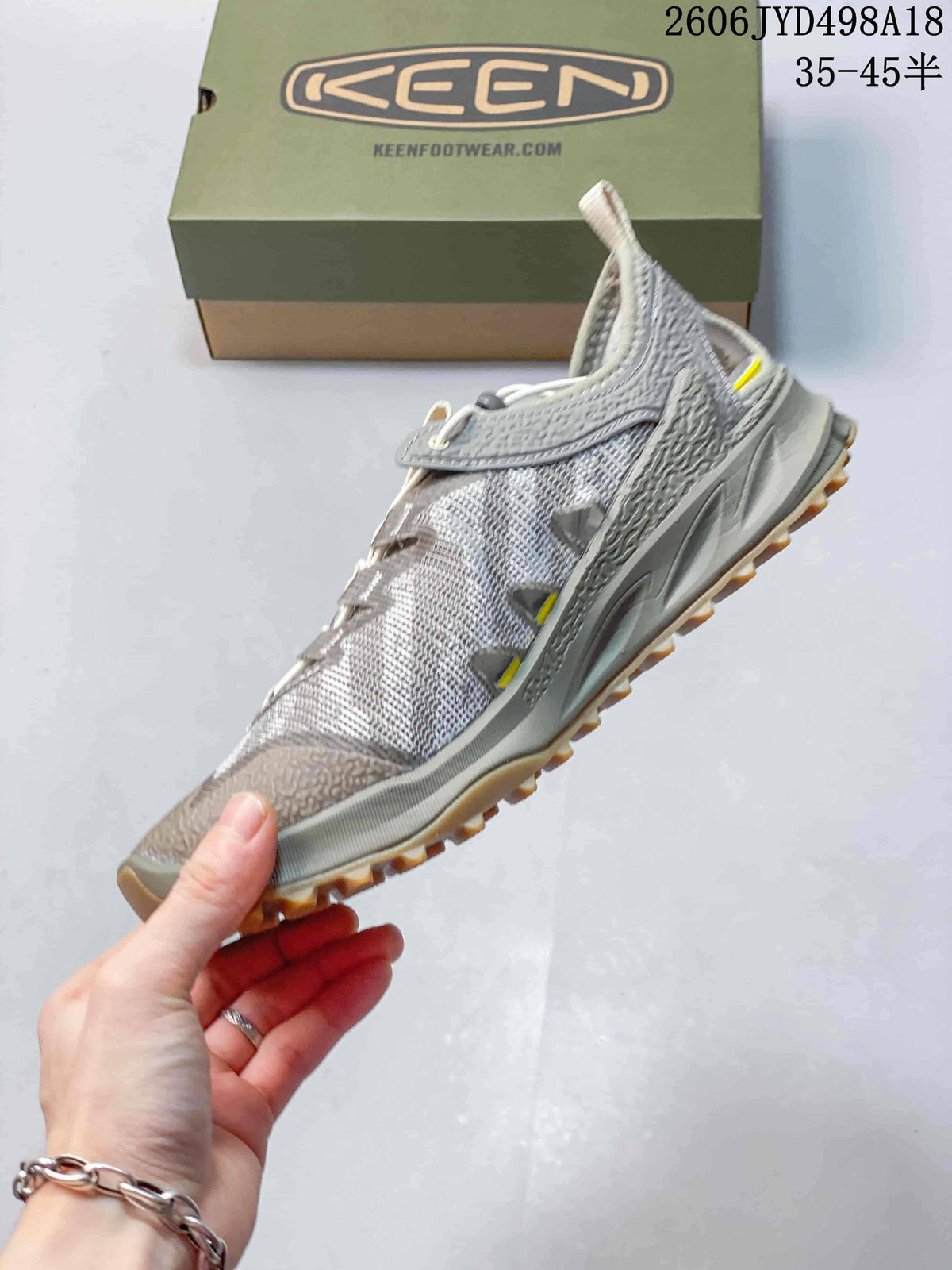 Side view of a gray and olive-toned KEEN Jasper Rocks SP sneaker