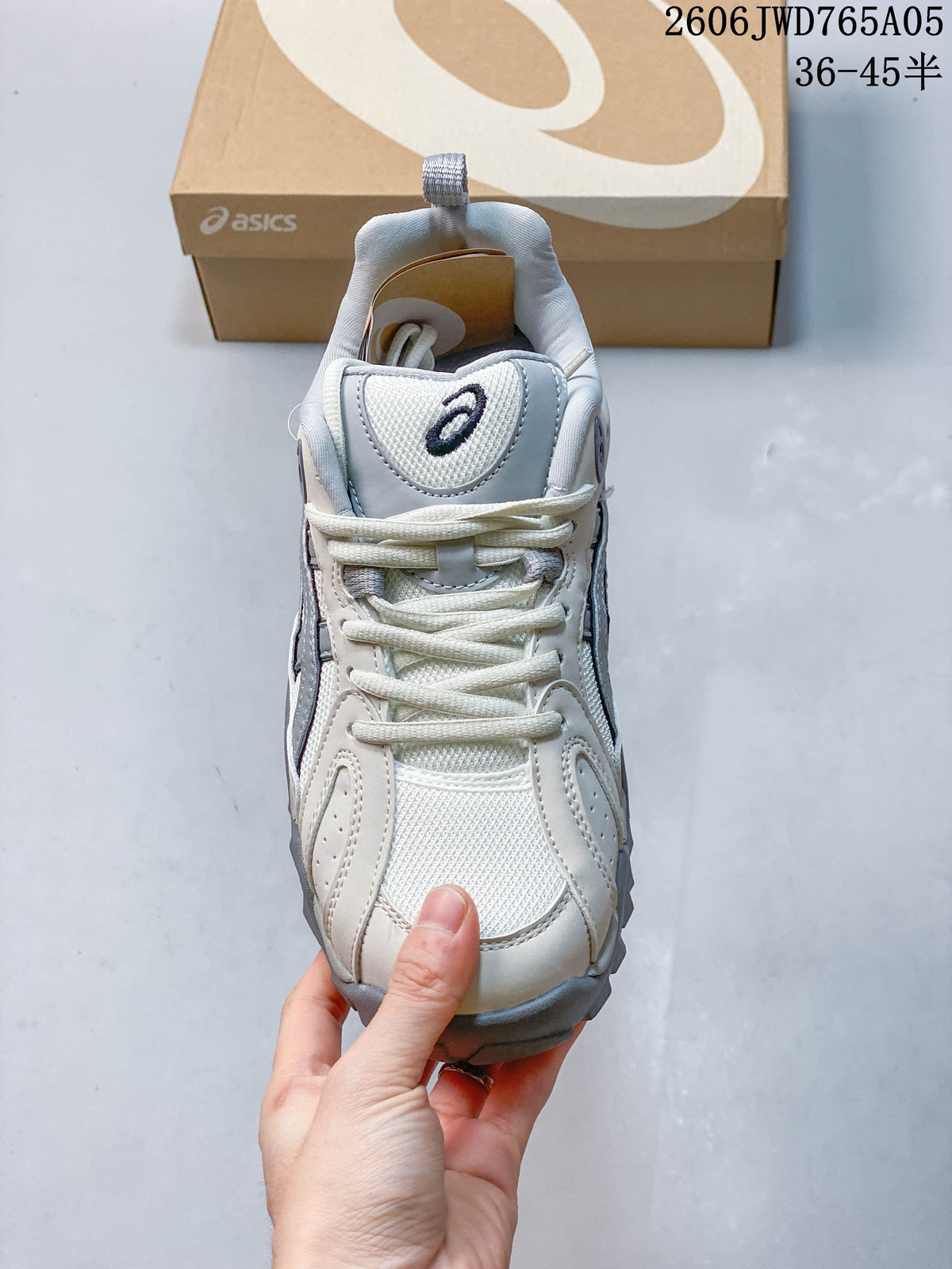 Top view of the laces and mesh panels on an ASICS Gel-TRUCK sneaker