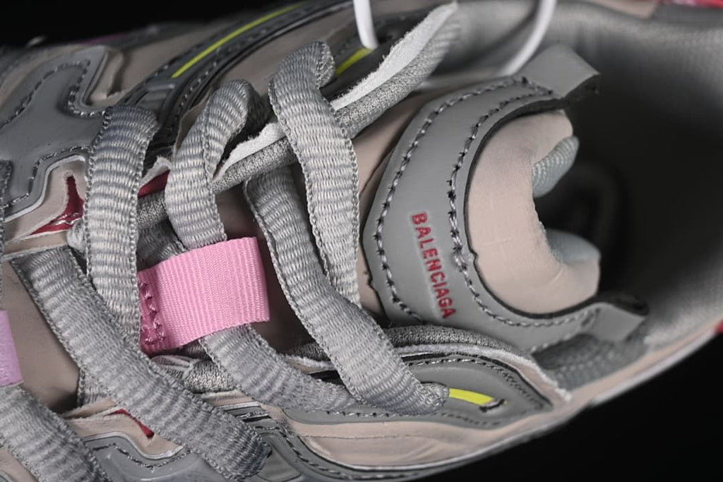 Close-up of the lace area, tongue, and layered upper detailing.