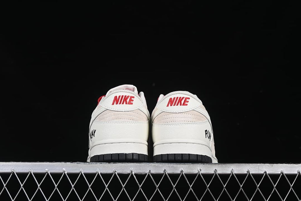 Rear view of both sneakers with red heel branding