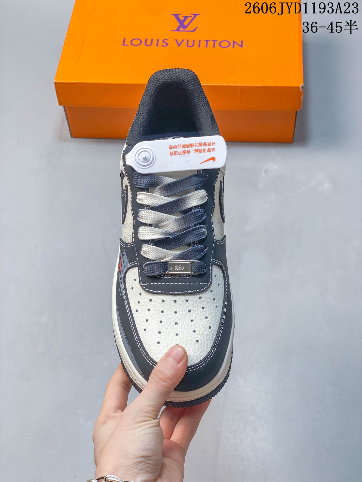 Top view of the perforated toe, layered laces, and dark tongue