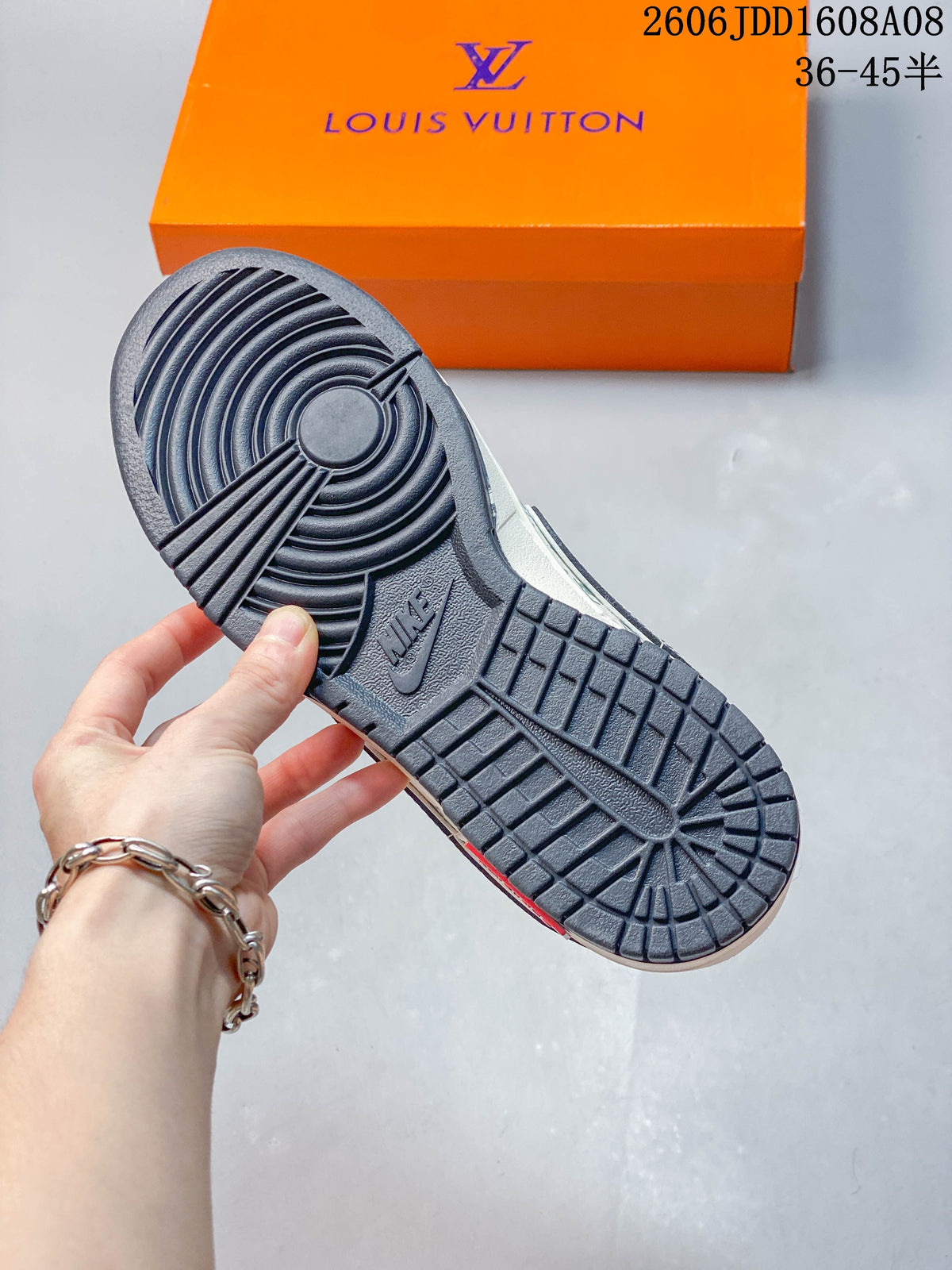 Close-up of the dark gray outsole on a Nike SB Dunk Low sneaker