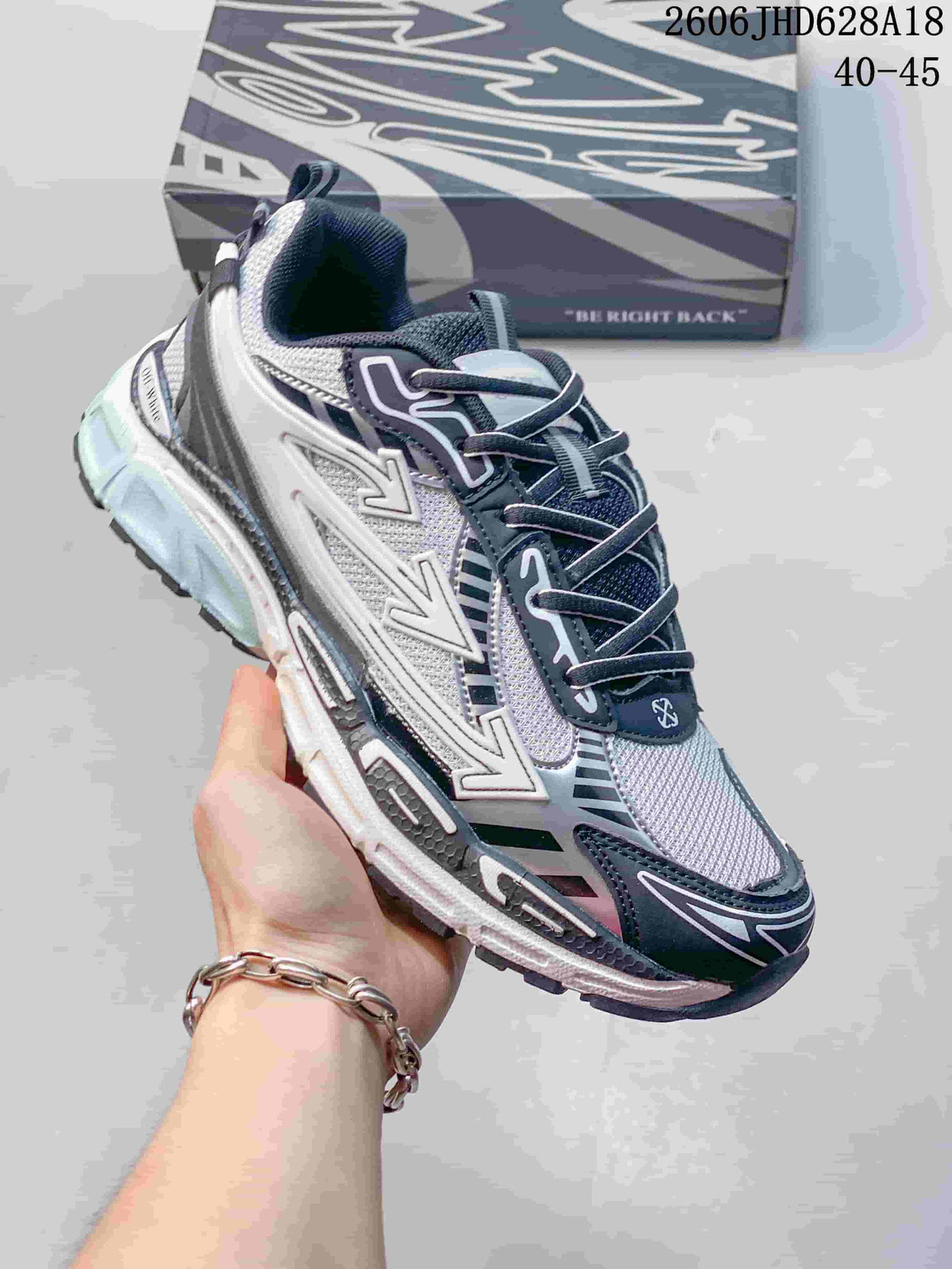 Angled view of the sneaker highlighting its side graphics and layered design