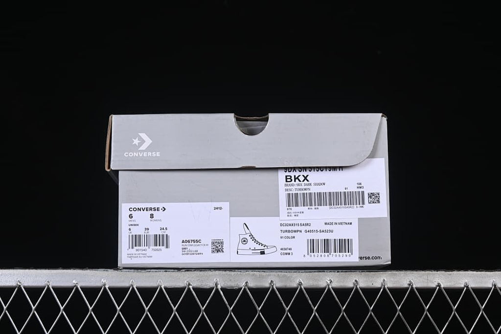 Shoebox labels showing the Converse Chuck 70 style and sample size information.