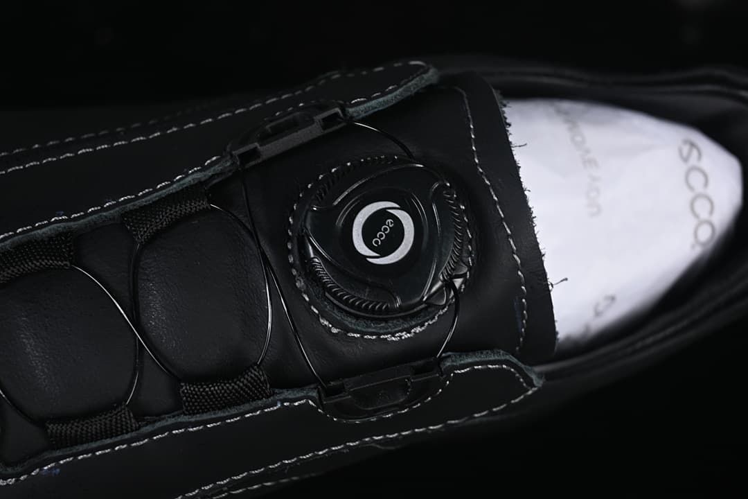 Close-up of the dial-adjustment closure on the shoe tongue