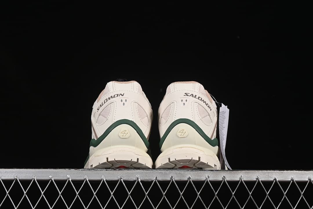 Rear view of the pair showing the heel details and outsole edges.