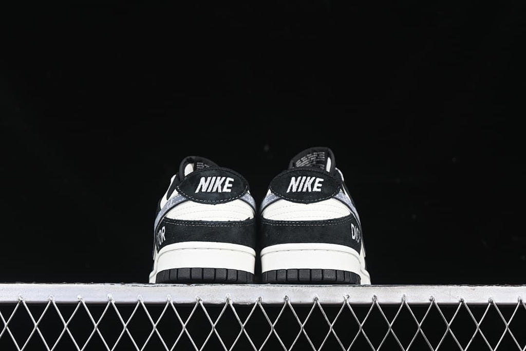 Rear view of both sneakers showing heel tabs and branding details.