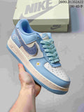 Light blue and white low-top sneaker with a glitter-effect Swoosh and daisy embroidery.
