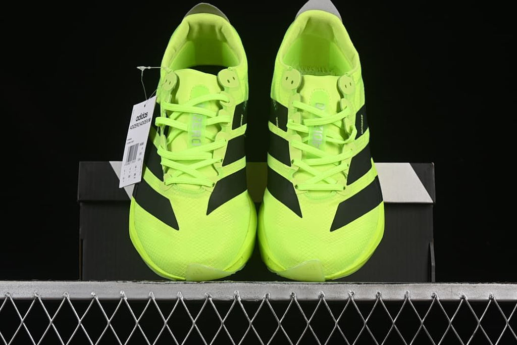 Front view of the pair of neon yellow running shoes