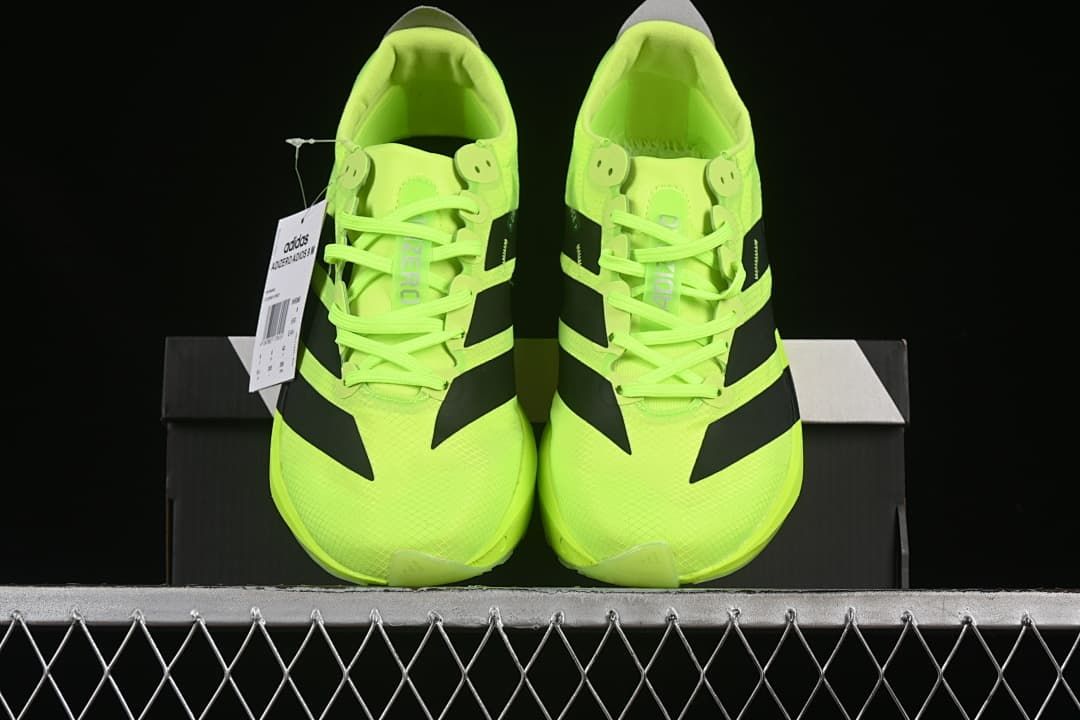 Front view of the pair of neon yellow running shoes