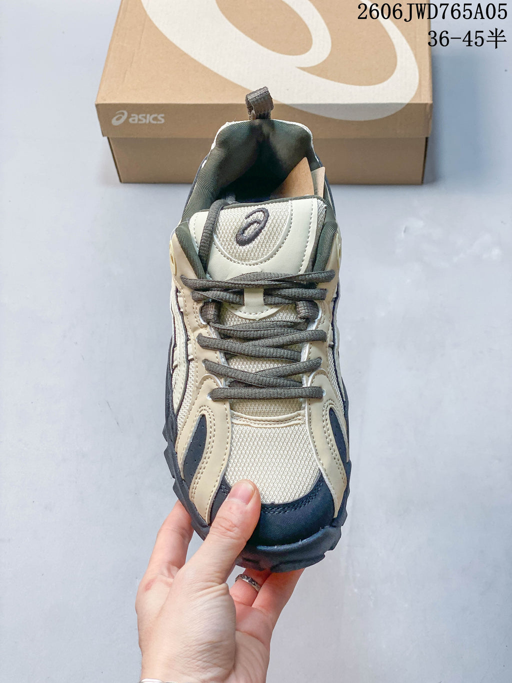Front view highlighting the mesh-look upper and lace-up closure