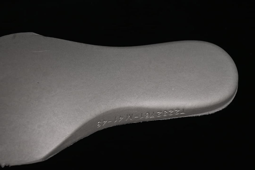 Close-up of the sneaker insole showing molded markings