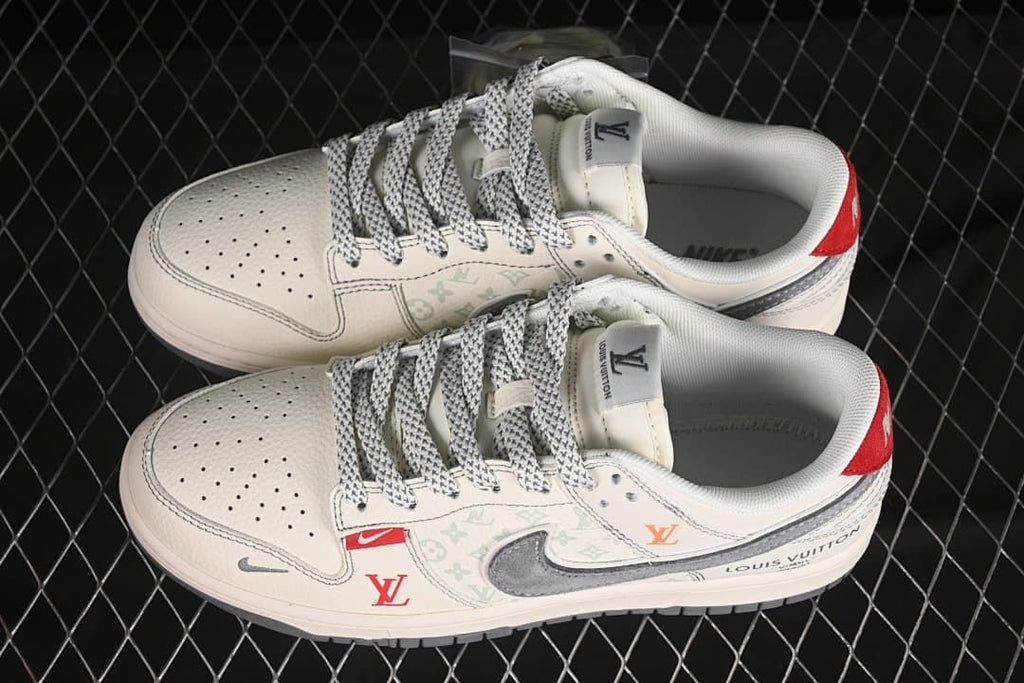 Top view of a pair of off-white low-top sneakers with patterned laces, gray swooshes, and red accents.