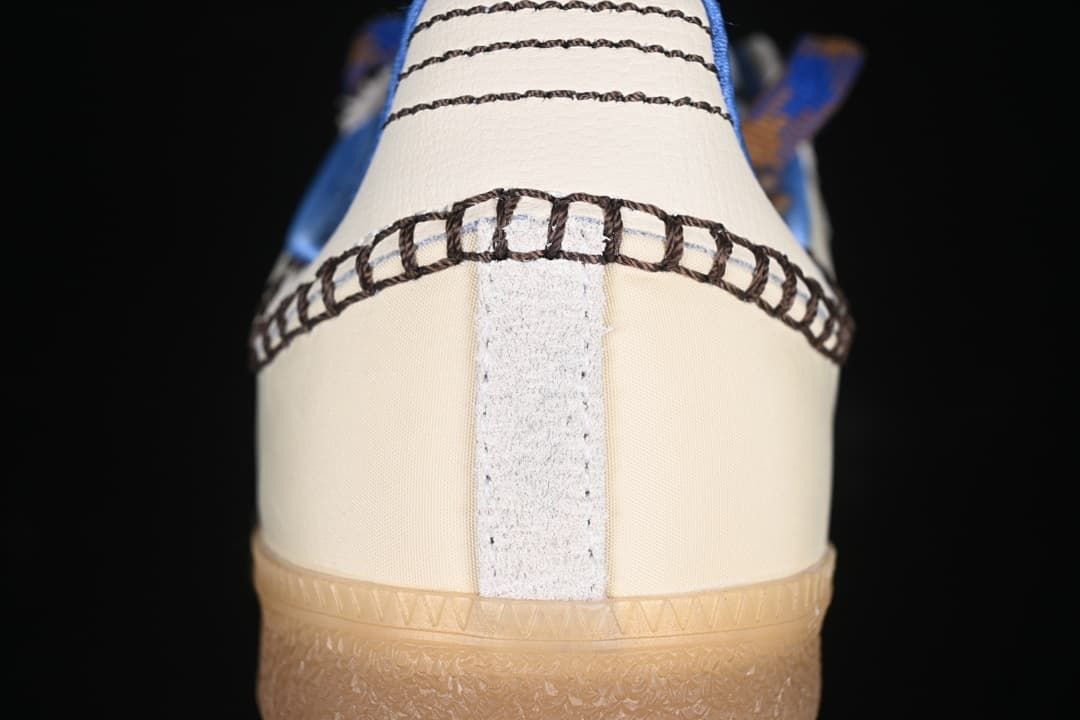 Rear view highlighting contrast stitching and gum-colored outsole.
