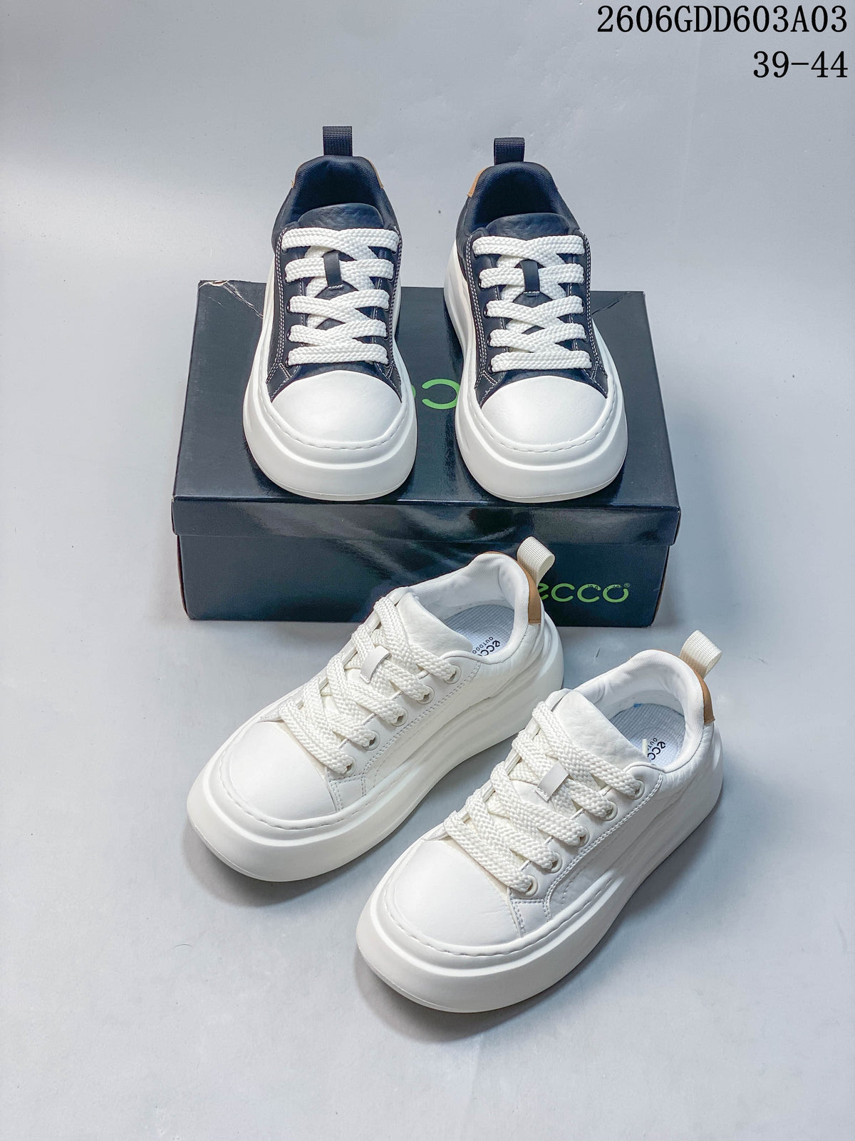 White and navy sneaker colorways shown together