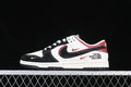 Side view of white, black, and red low-top sneakers with North Face graphics