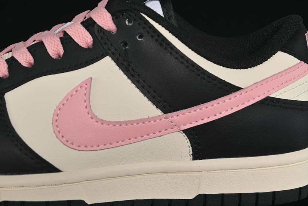Close-up of the pink Swoosh and contrasting upper panels