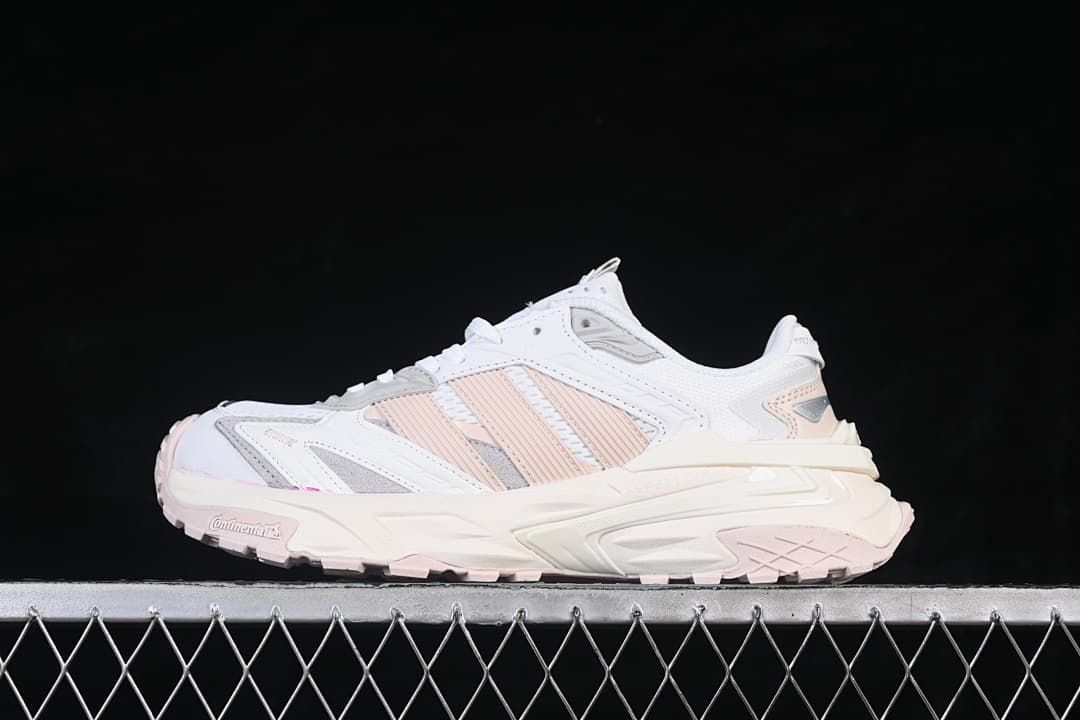 Side profile of the white and pink XLG Storm Edge sneaker