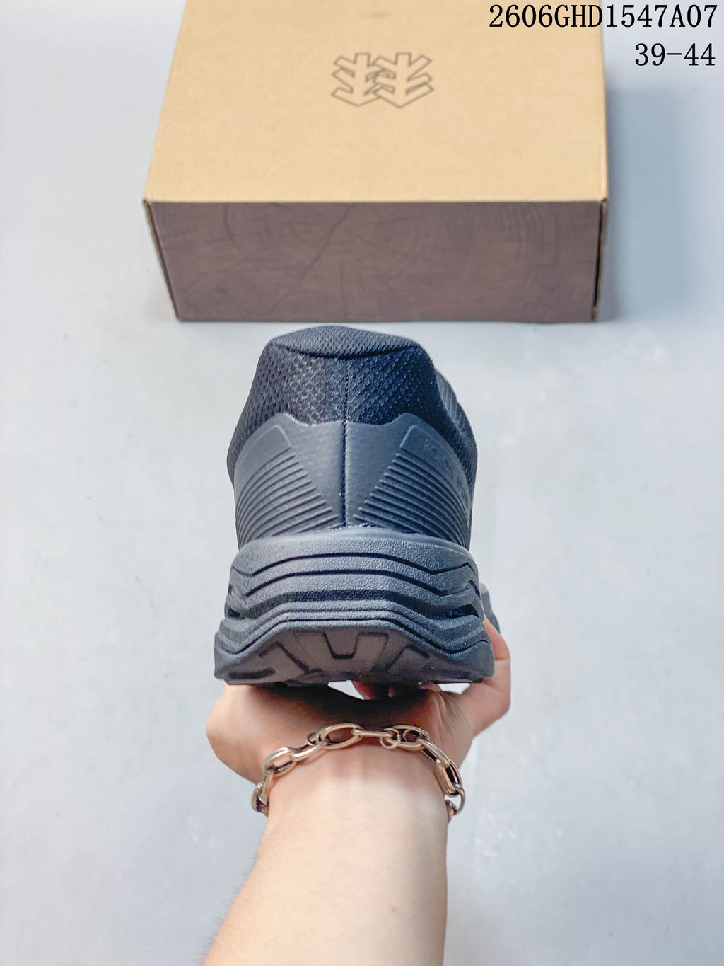 Rear view showing the sneaker heel and layered sole