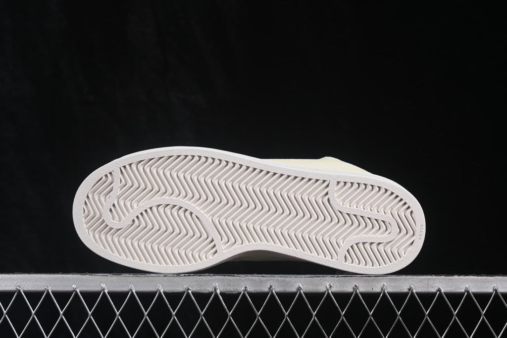 Underside view showing the white herringbone-pattern outsole.