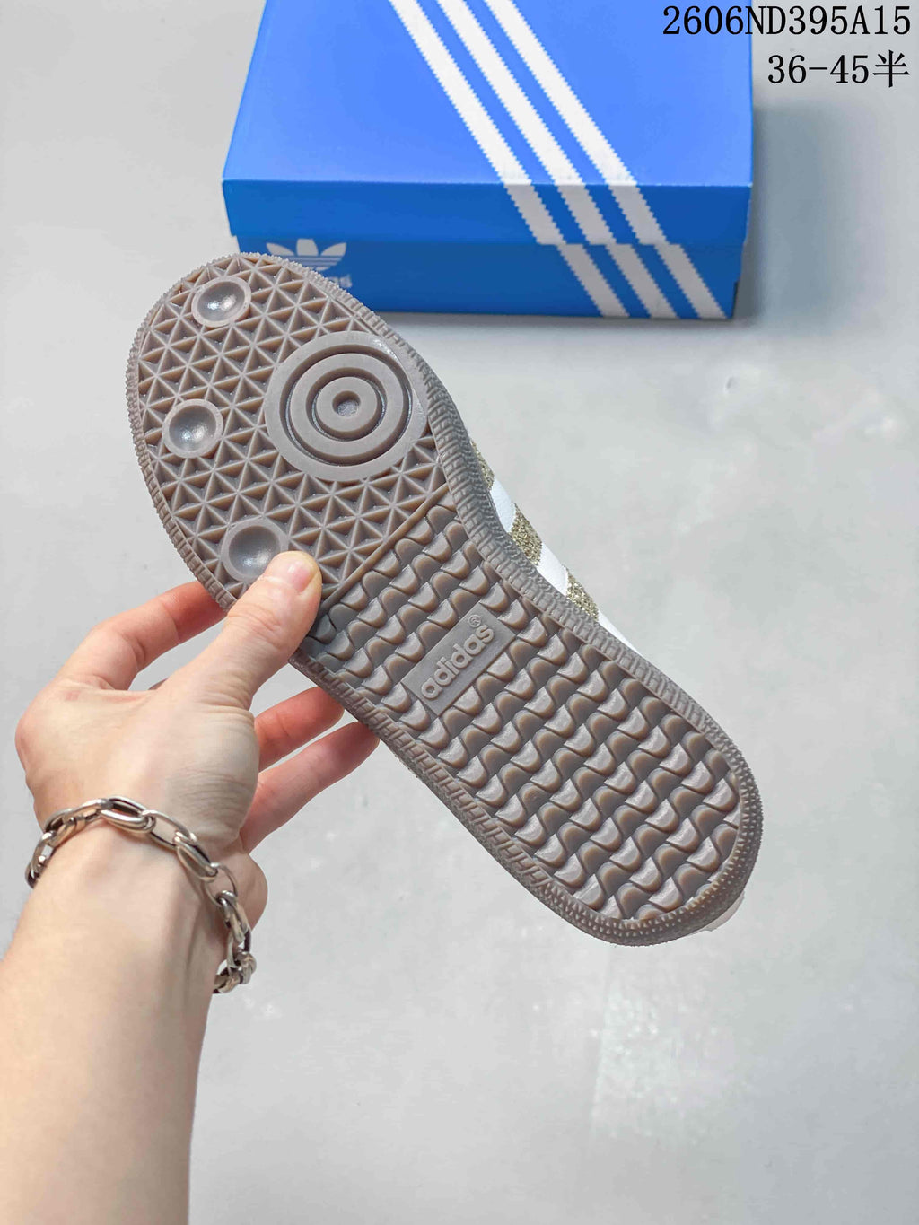 Close-up of the textured gum-style outsole on the Adidas low-top sneaker