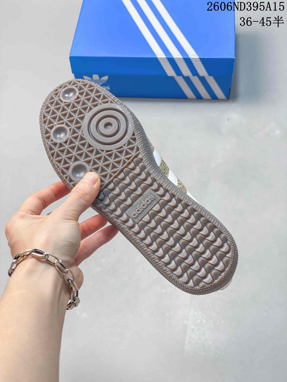 Close-up of the textured gum-style outsole on the Adidas low-top sneaker
