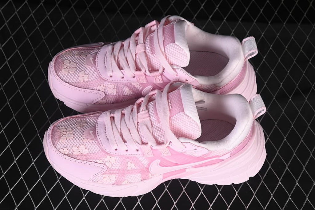 Pair of pink Nike V2K Run sneakers viewed from above