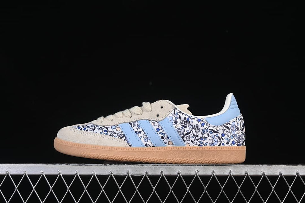 Side profile of the adidas Samba OG sneaker against a black background