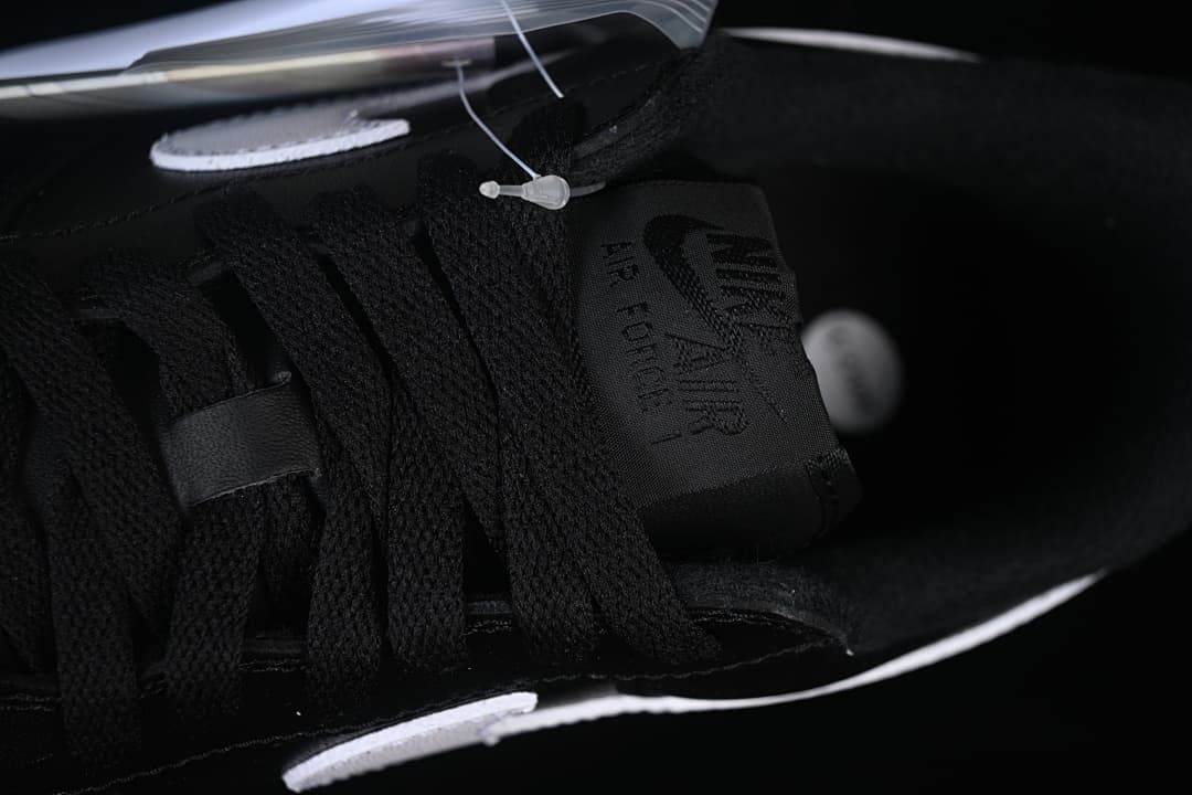 Close-up of black laces and the Air Force 1 tongue label