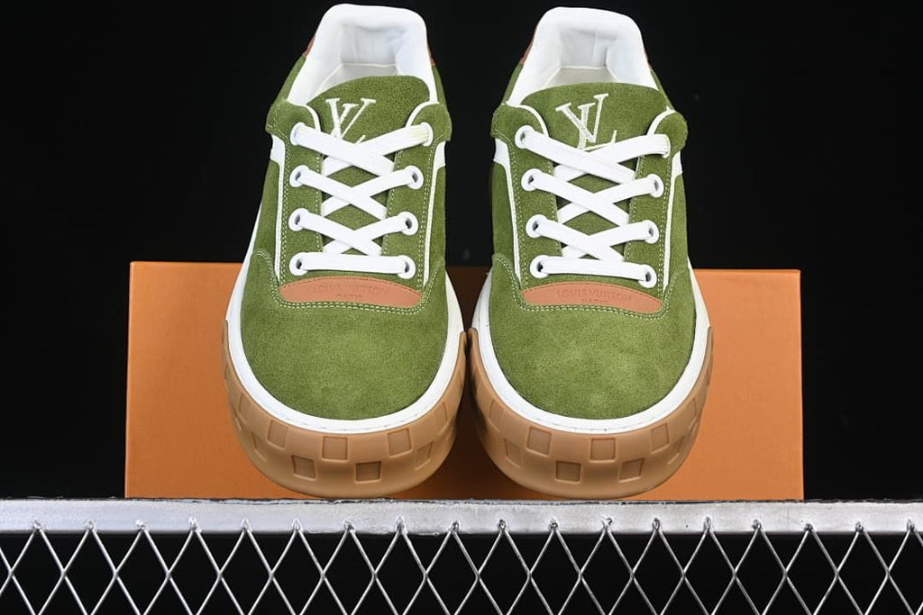 Front view of the pair with white laces and tan outsole