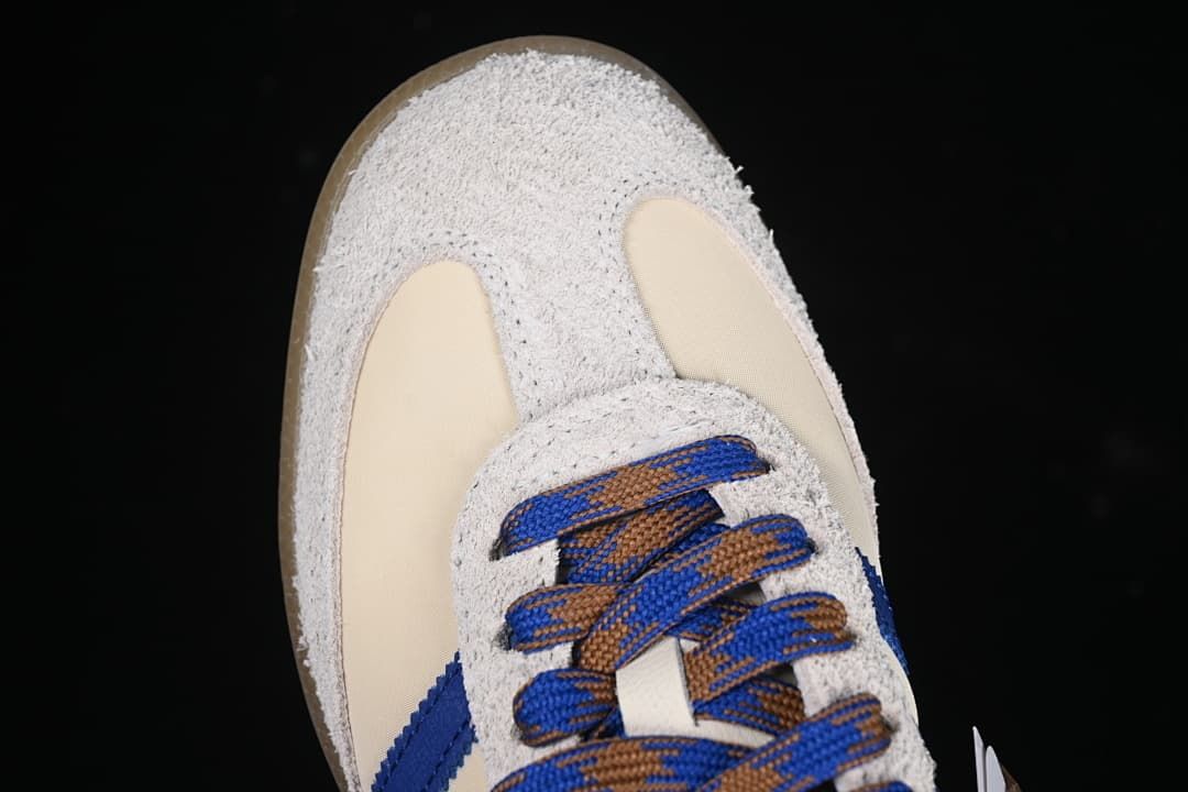 Top view of textured toe and multicolored laces.