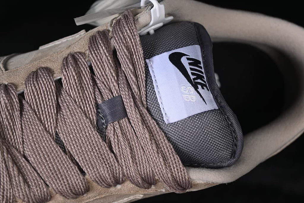 Close-up of brown laces and Nike SB tongue label