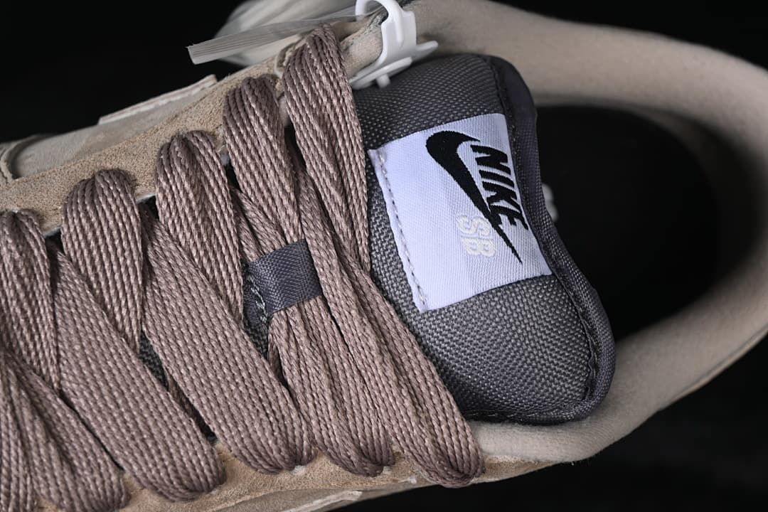 Close-up of brown laces and Nike SB tongue label