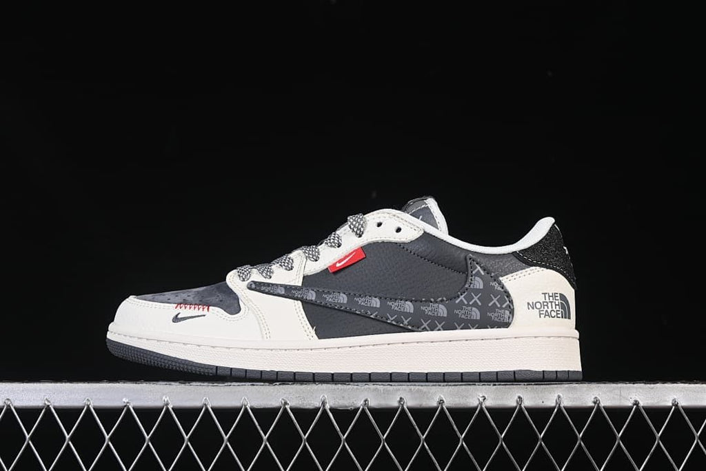 Side view of a dark gray and off-white low-top sneaker with patterned side graphics.