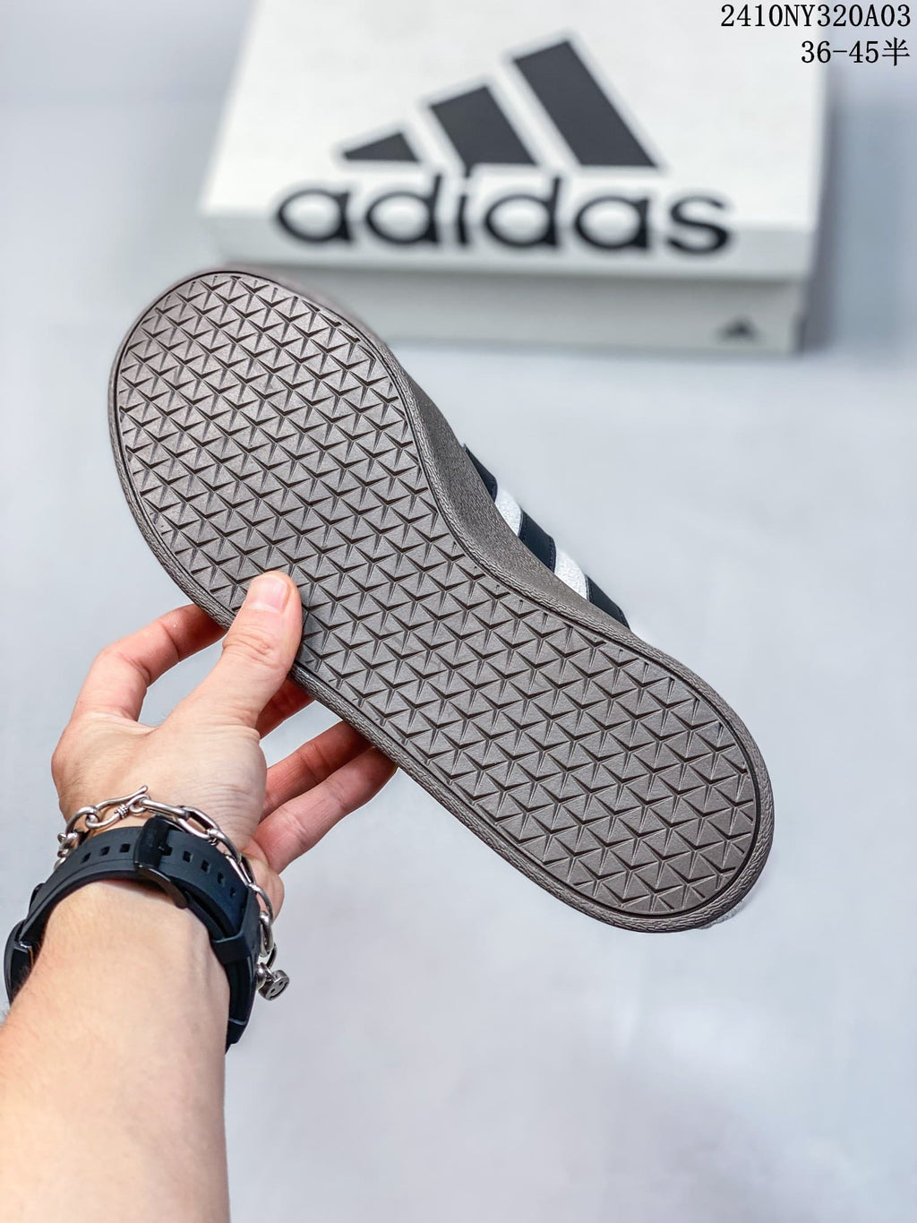 Close-up of the brown-toned outsole with a repeating geometric tread pattern