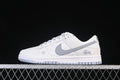 Side view of a white low-top Nike SB Dunk with a grey Swoosh, grey laces, repeated script print and heel graphic.