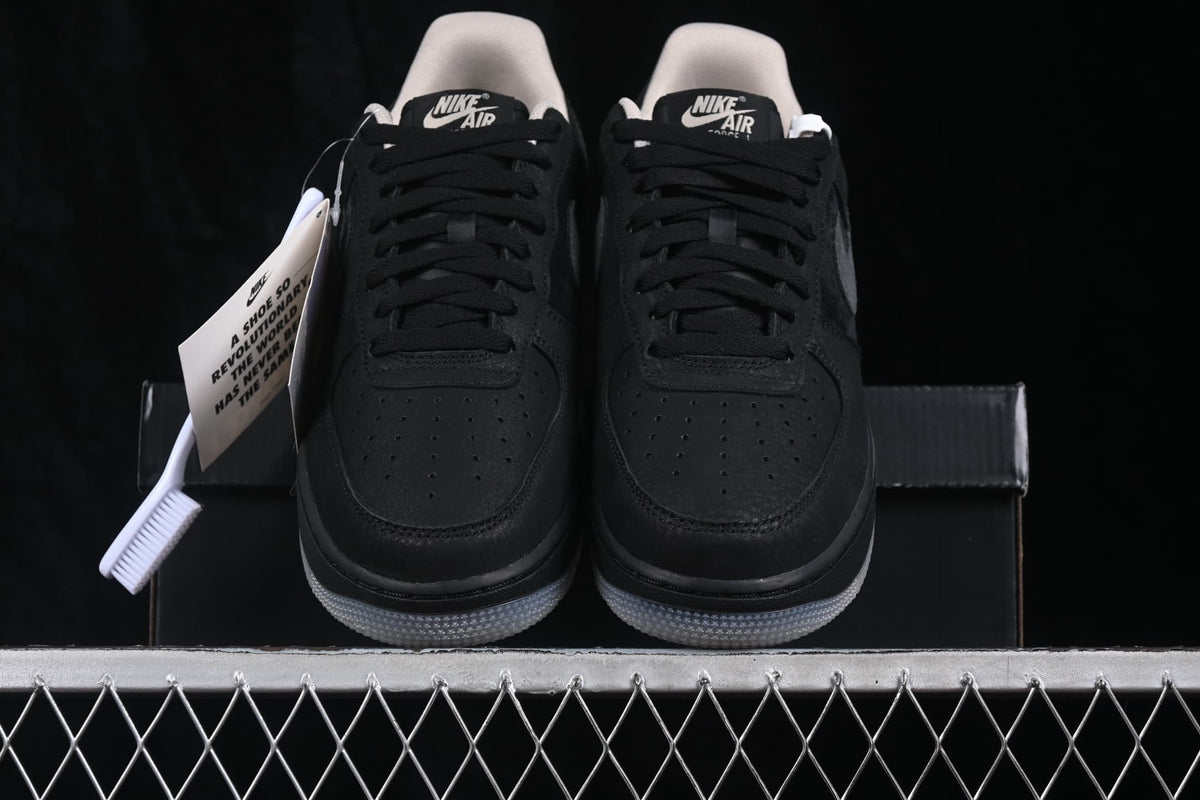 Front view of the pair showing black laces, perforated toe boxes, tongue branding, and translucent-looking outsole edges.