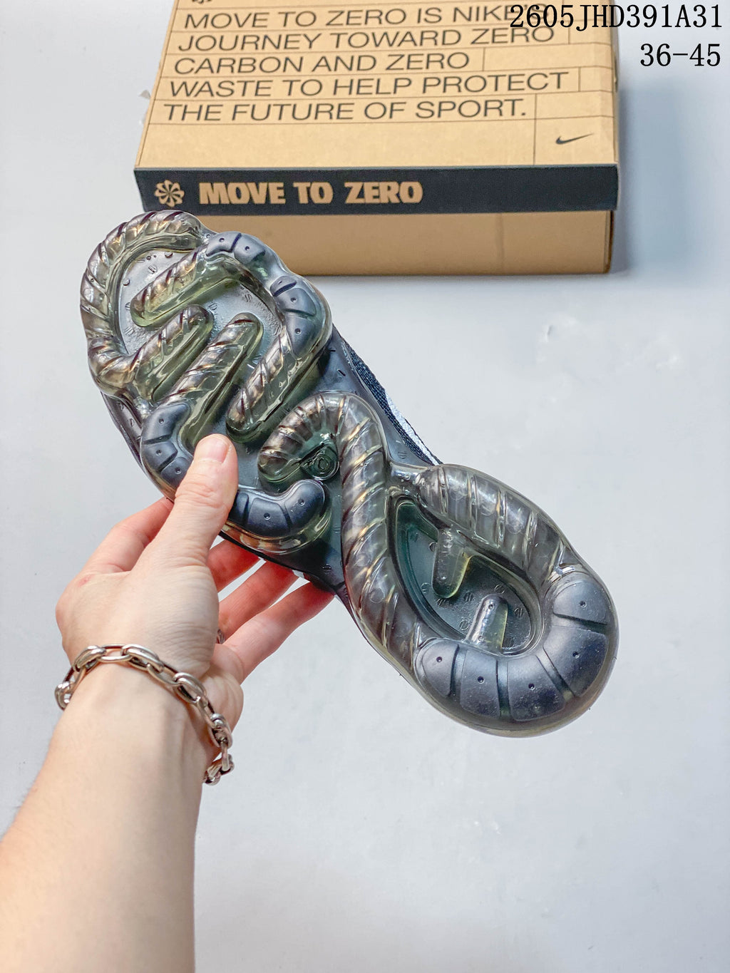 Underside view showing the full-length visible sole unit on a Nike Air VaporMax shoe