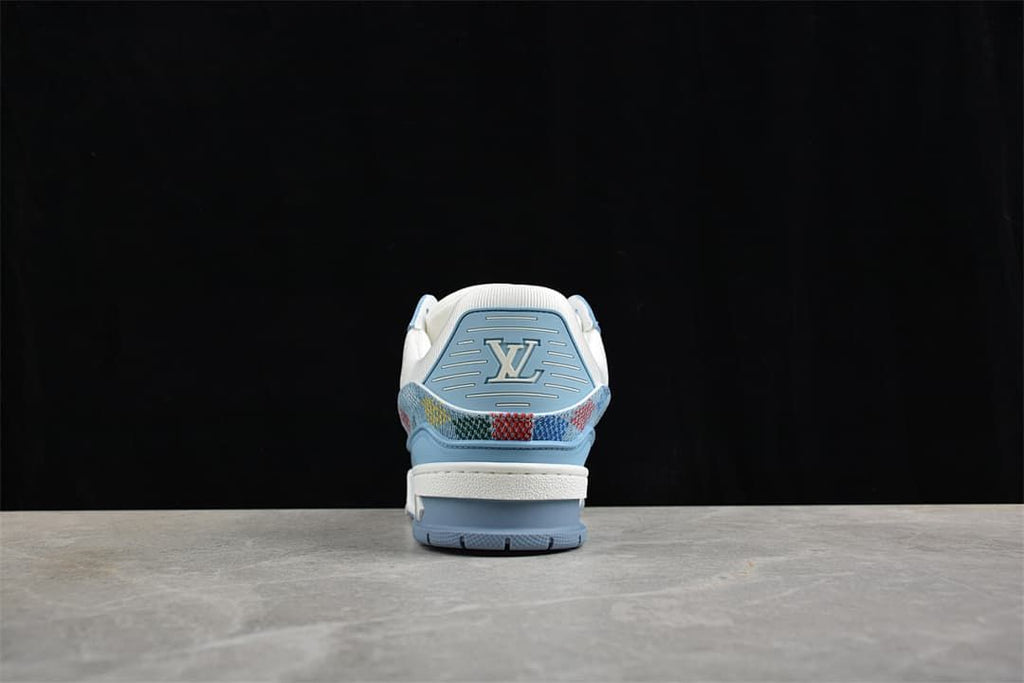 Rear view showing the blue heel panel and patterned trim.