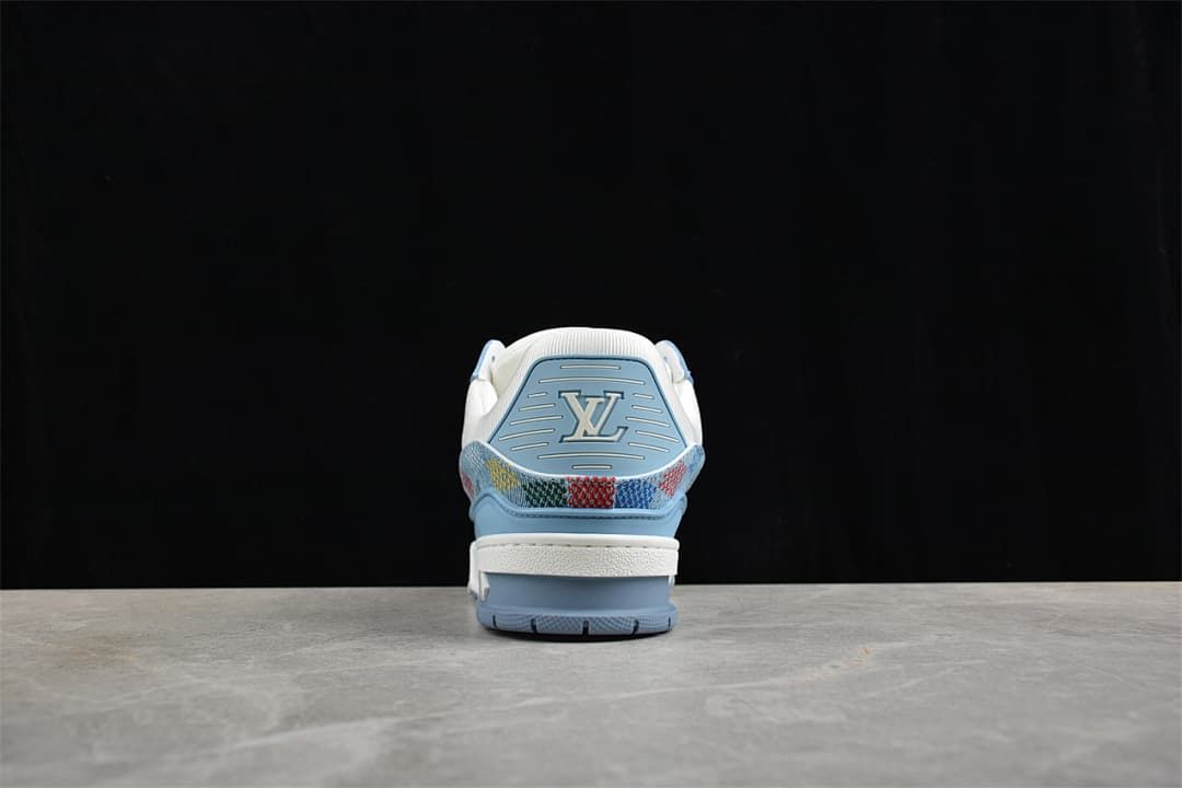 Rear view showing the blue heel panel and patterned trim.