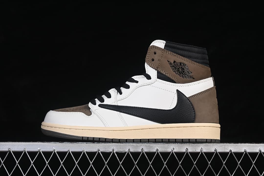 Side view of a brown, white, and black high-top sneaker with a reversed Swoosh